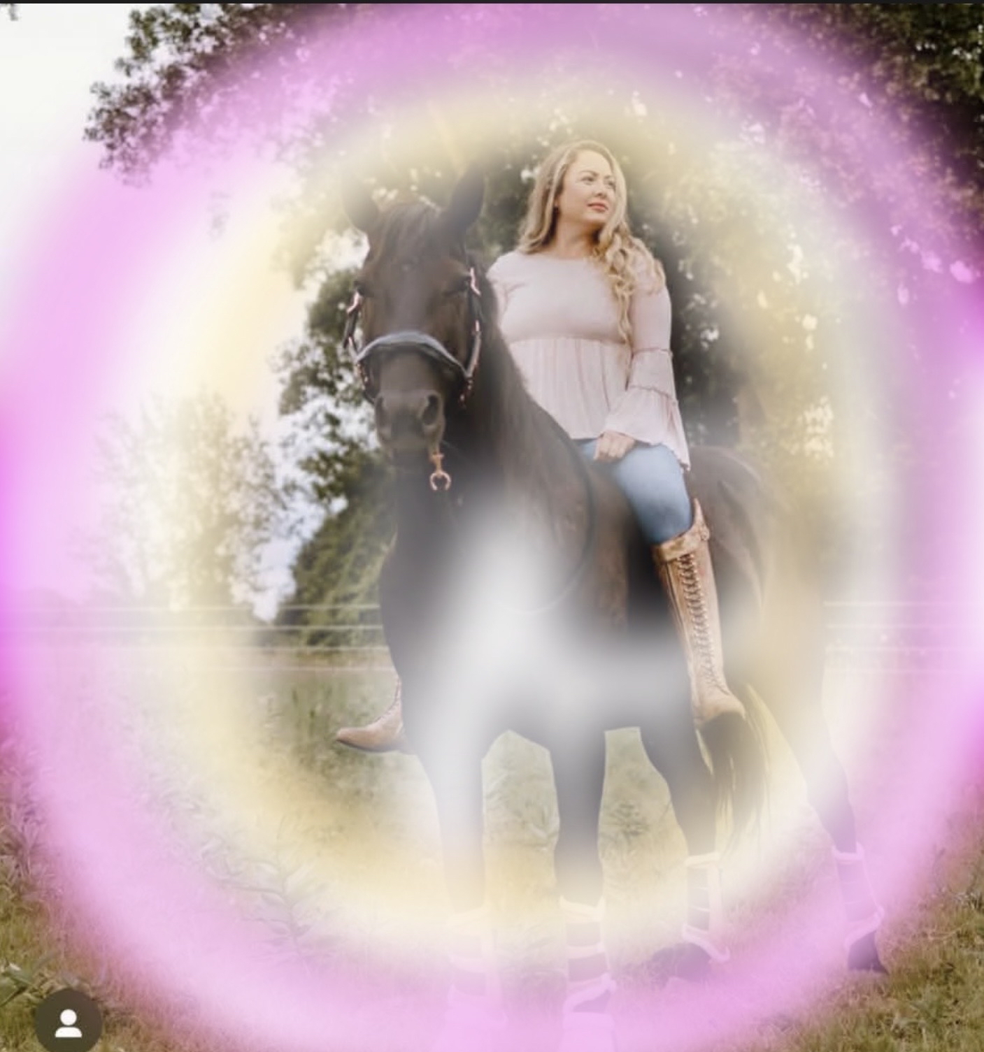 Memorial aura image of a caregiver seated on a dark horse in a sunlit field, surrounded by a soft violet and gold ring of light.